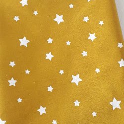 Tissu coton étoile jaune moutarde